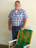 Larry Ellison, winner of the butterfly chair
